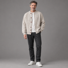 Men's knit relaxed cardigan, full-body standing shot