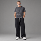 Men's cotton relaxed pants, full-body standing shot