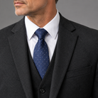 Men's woven tailored suit, close-up of notch lapel detail