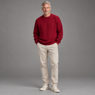 Men's cable knit sweater, full-body standing shot