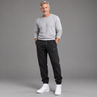 Men's ribbed jogger pants, full-body standing shot