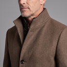 Men's wool overcoat, close-up of stand collar, quilted lining and wool texture